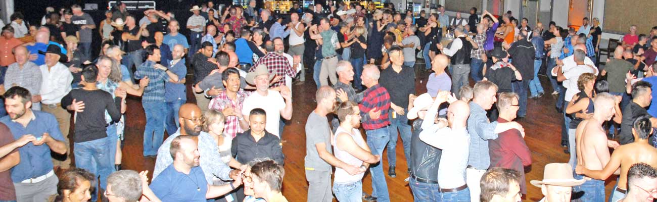 crowded dance floor at the Stompede